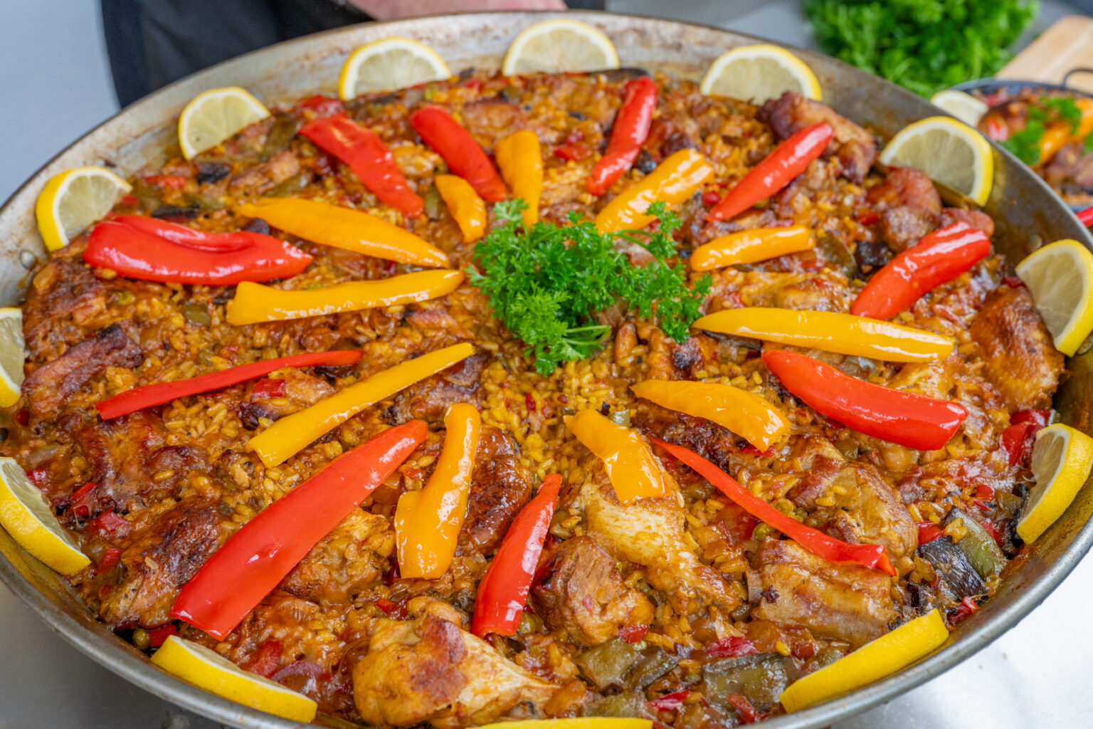 Paella Mixta with chicken, pork rib and roasted red and yellow peppers
