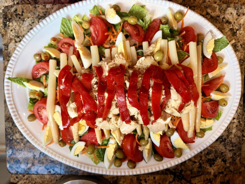 Ensalada mixta with piquillo peppers, white asparagus, egg and tuna