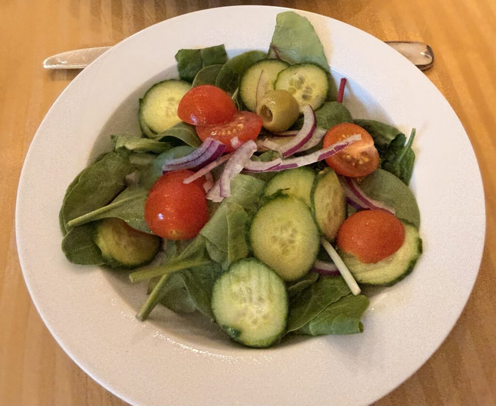 House salad with cucumber, tomato and red onion