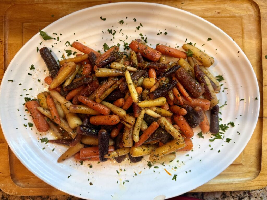 Roasted tri-color baby carrots with cumin and honey glaze